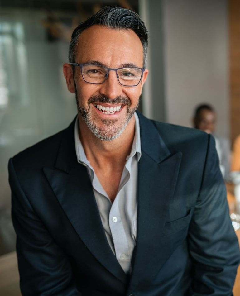 two businessmen viewing smartphone